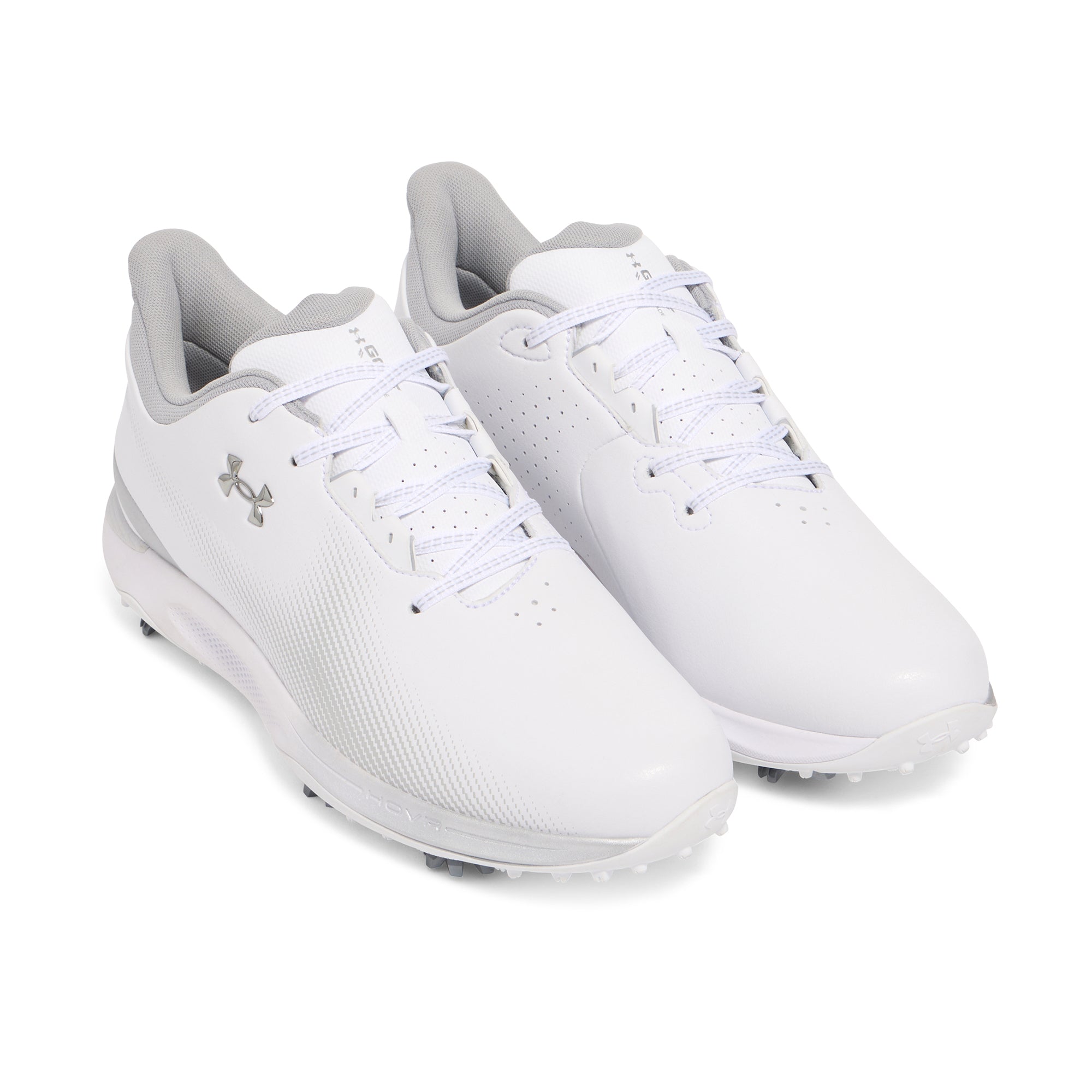 white and silver under armour cleats