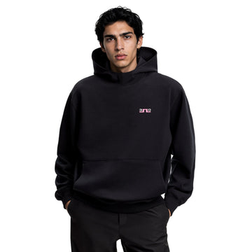 Person wearing a black hoodie with a logo on a white background